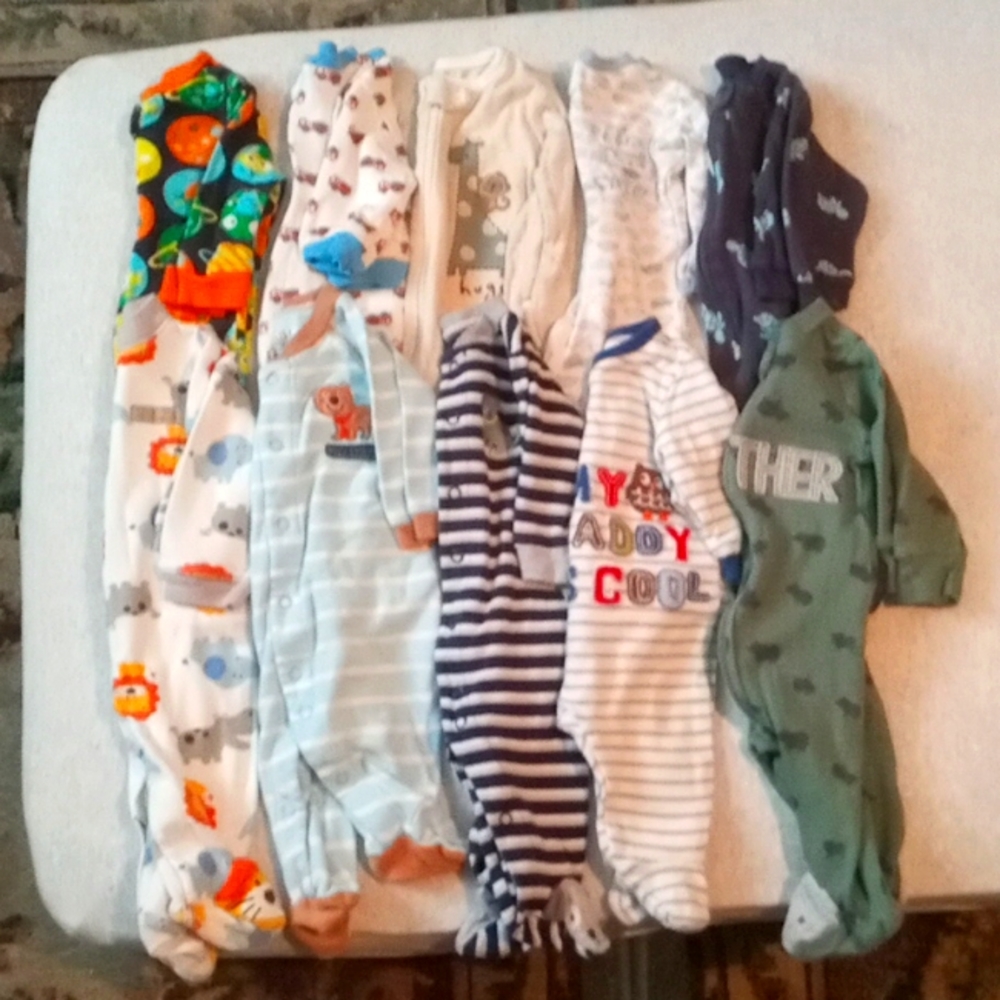 Bundle of 10 0-3 month long sleeved footy onesies.